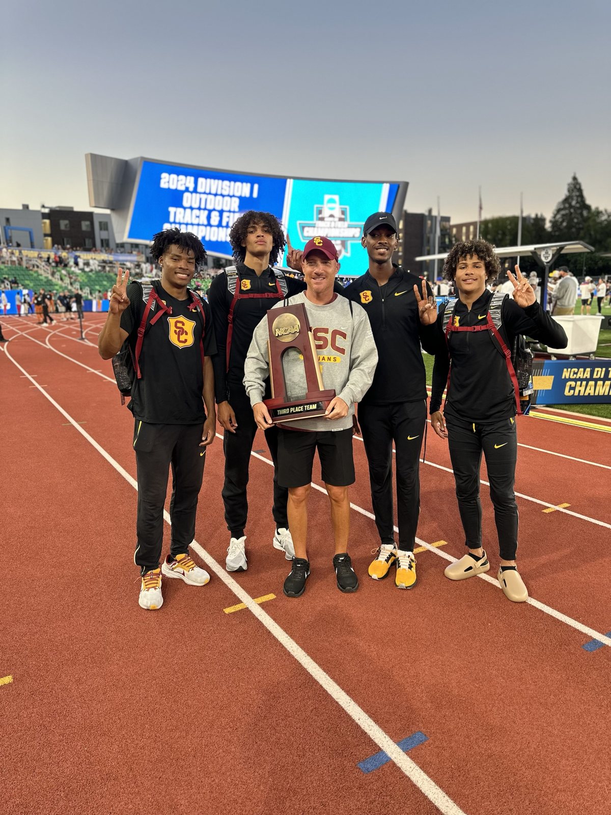 The USC jumps group with their trophy at the NCAA Outdoor Championships